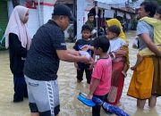 Aksi Nyata KNPI-AMK Bantu Korban Bencana Banjir di Sampang, Bagikan 200 Bungkus Takjil Buka Puasa